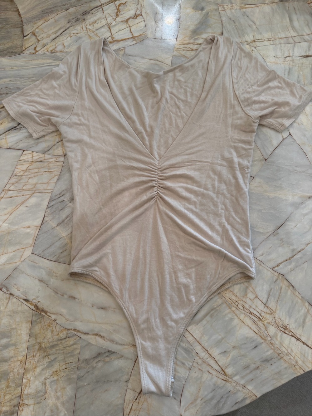 Ruched V-Neck Short Sleeve Bodysuit in Light Beige